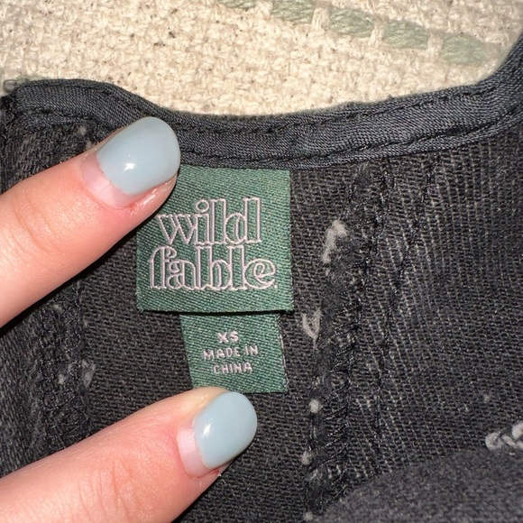 Wild fable black corset top size XS but will fit a small, stretchy material - Picture 3 of 3